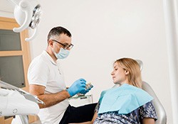 Dentist and patient talking during consultation