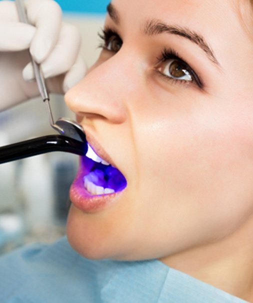 up of woman during cosmetic dental bonding in Newbury Park, CA