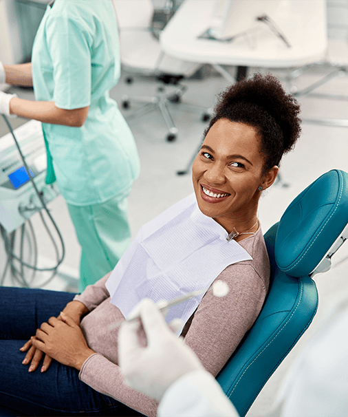 Woman smiling at the dentist’s office