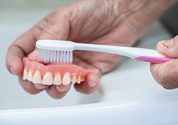 Denture is brushed