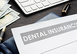 Dental insurance form lying on a table