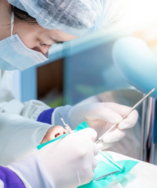 Dentist fitting patient for occlusal splint