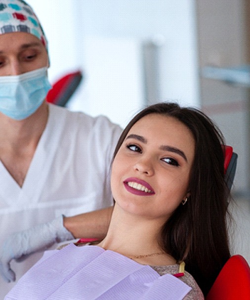 young woman getting veneers in Newbury Park