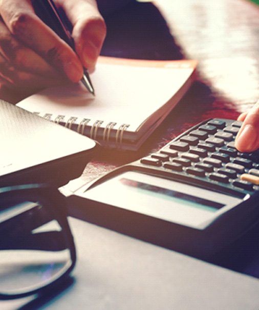 Woman using a calculator